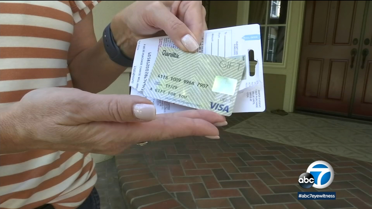 A Hand Holding a Visa 150 Dollar Gift Card. Editorial Photography