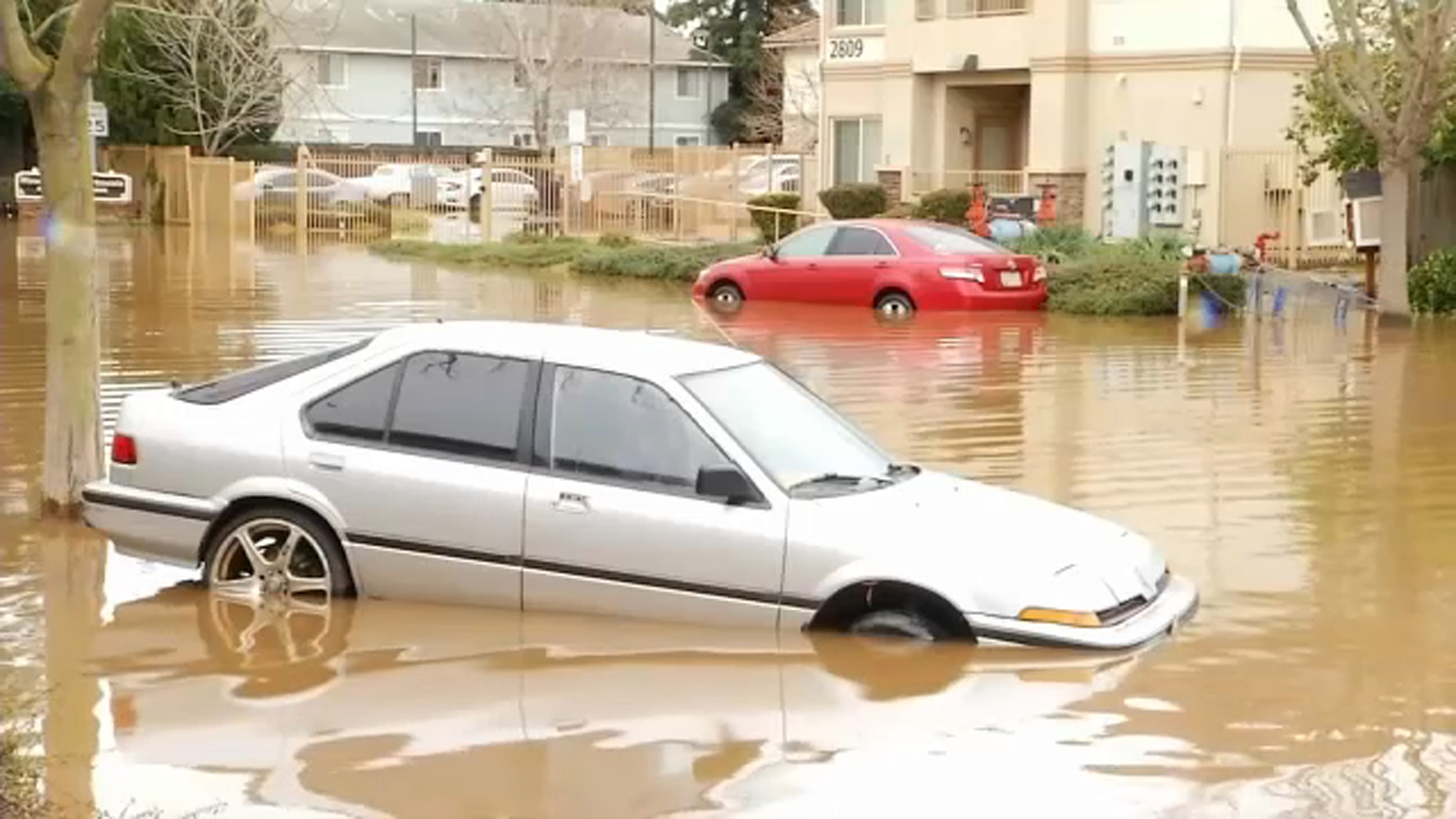 Countless cars left damaged by fierce flooding across the Valley