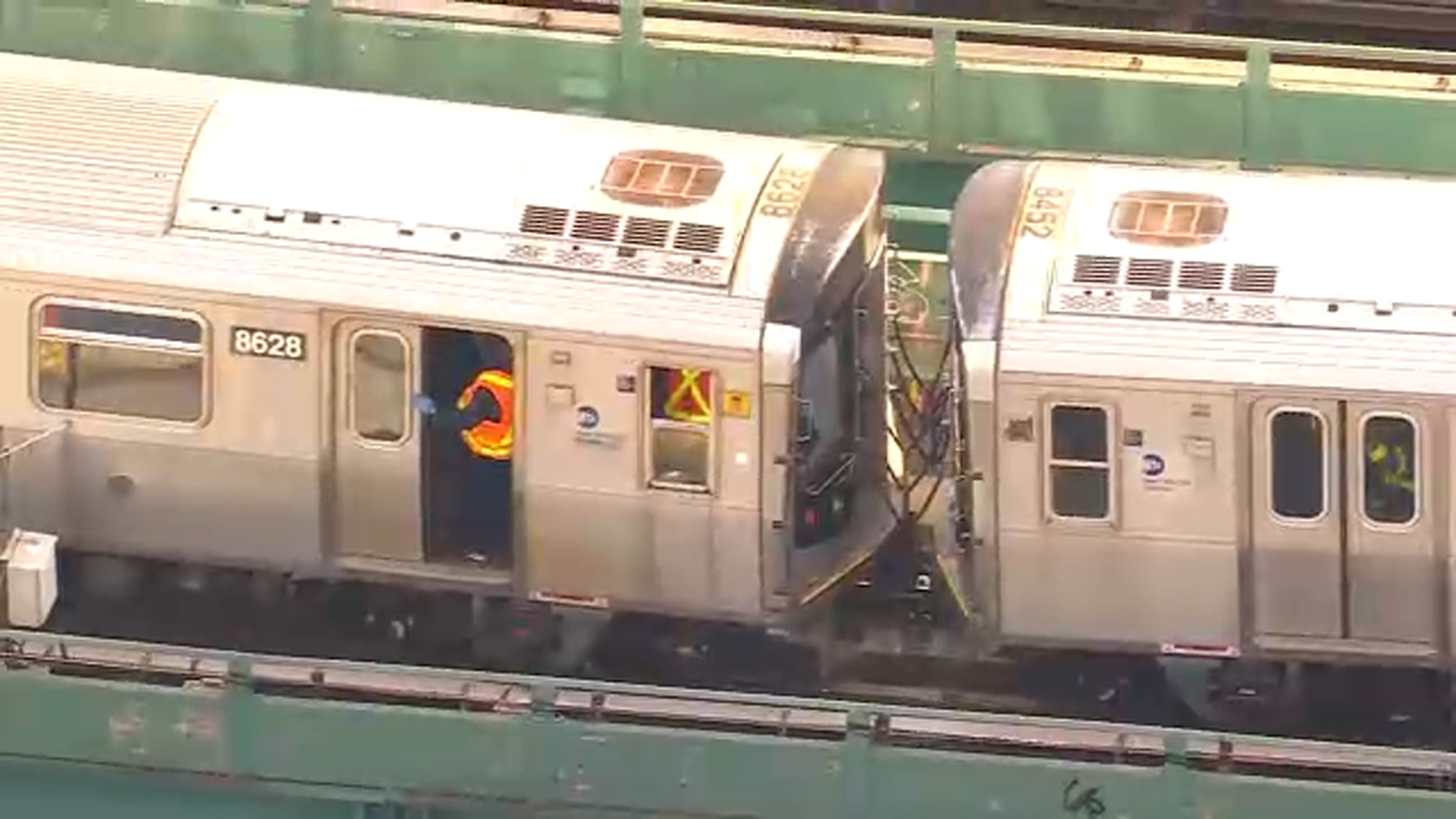 Passengers rescued from smoky disabled J train after hitting
